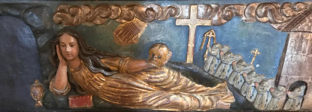 Bas-relief on an altar showing the penitent mary magdalene scean