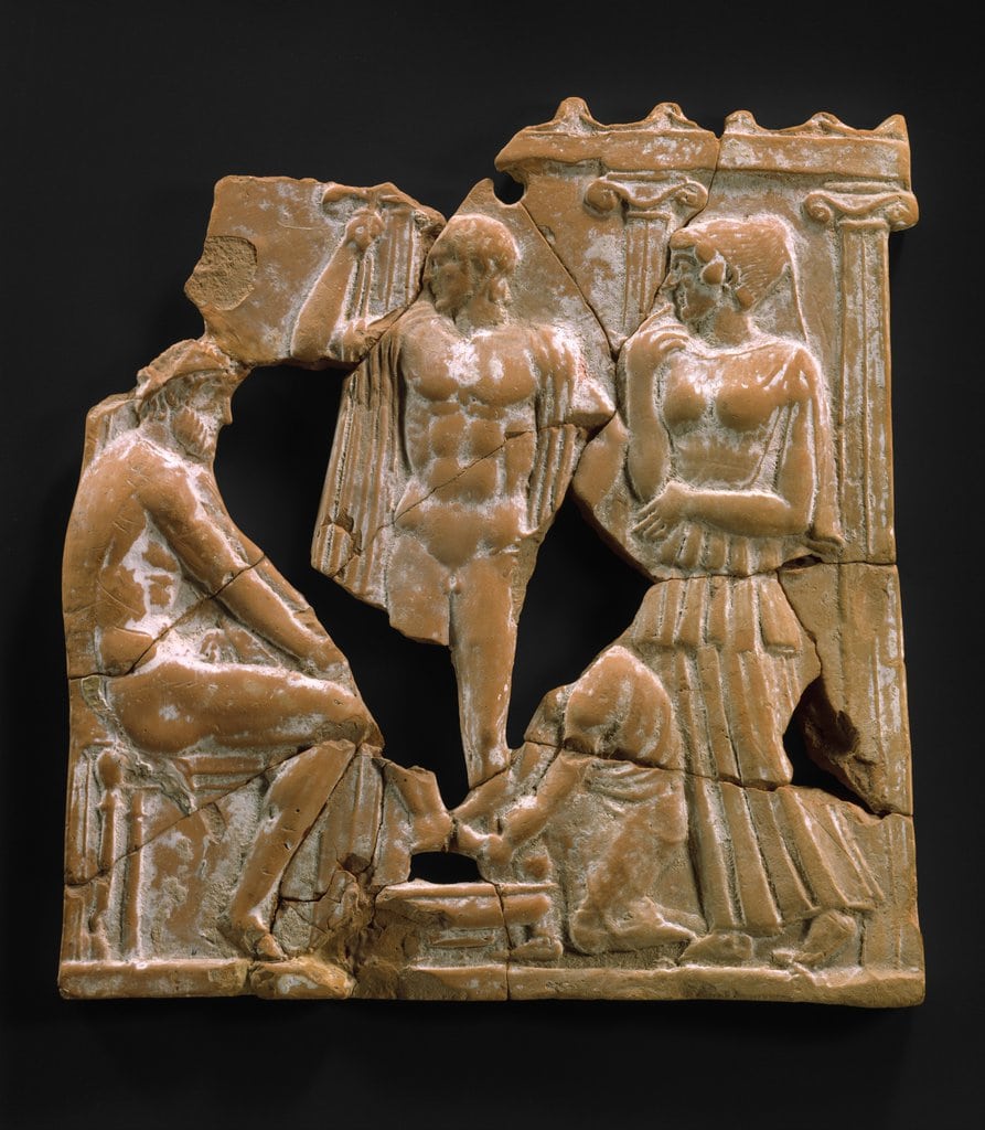 Image of an ancient terracotta stone showing the role of women in ancient greece