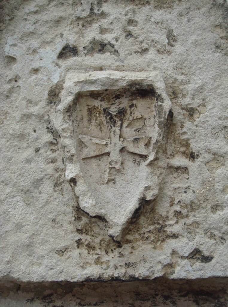 Huguenot cross at la rochelle based on the knights of malta cross in the court of the commandery, la rochelle