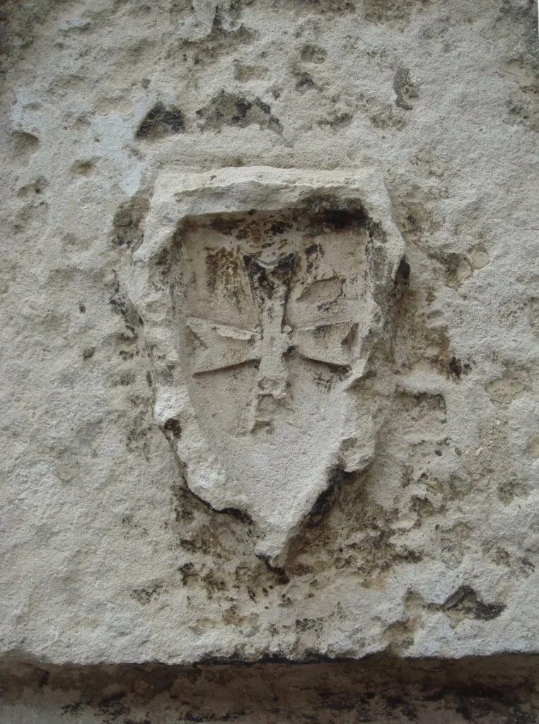 Huguenot cross at La Rochelle based on the Knights of Malta Cross in the Court of the Commandery, La Rochelle